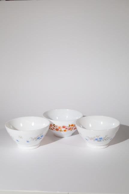 Vintage Arcopal set of three floral pattern bowls