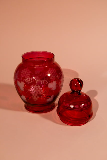 Vintage decorative bottle with vine pattern