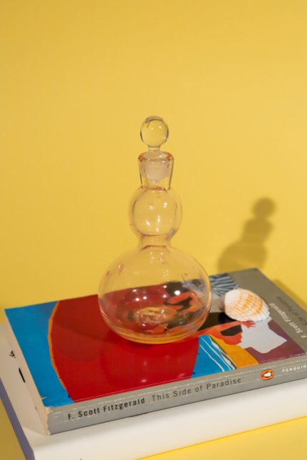 Vintage light pink decorative glass bottle