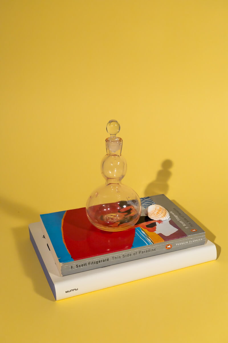 Vintage light pink decorative glass bottle