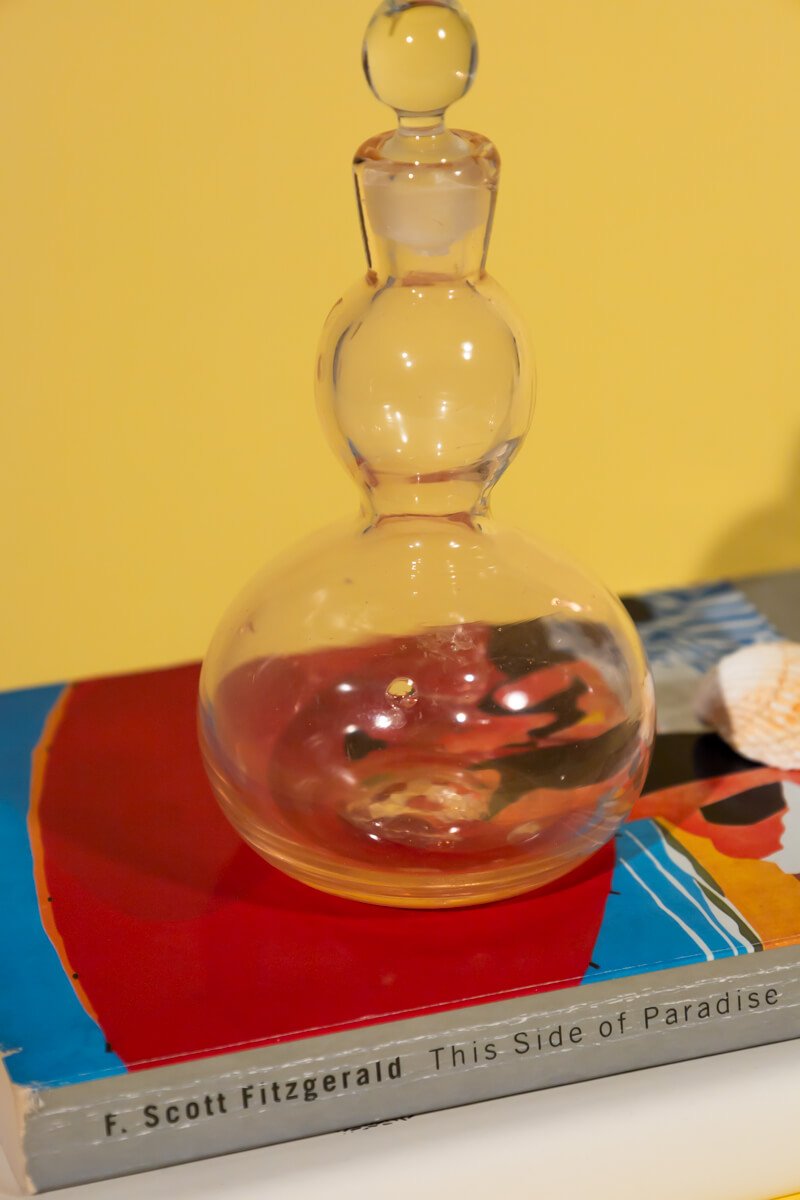 Vintage light pink decorative glass bottle